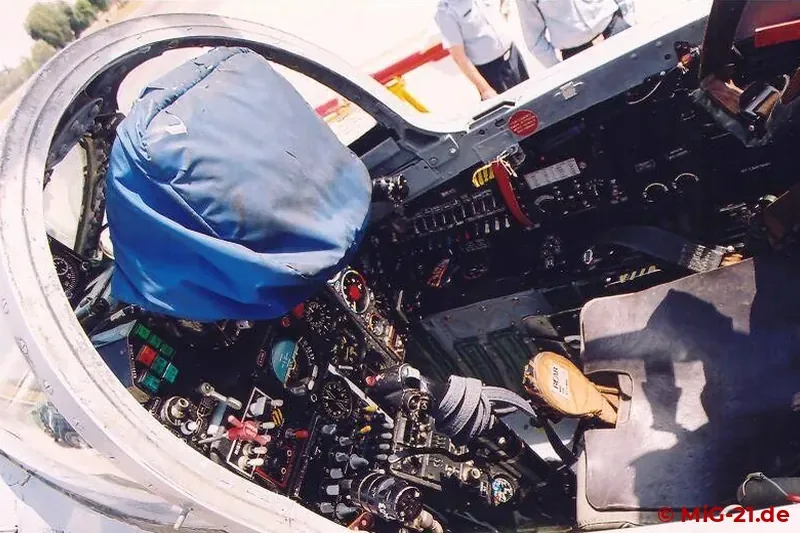 In the cockpit of the F-7P beside classic instruments can be found a head-up display (covered) and a Martin …