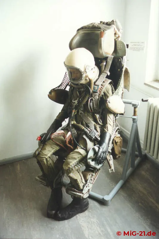 ... while later versions were equipped with the KM-1, developed by MiG. The pressure suit shown here ...