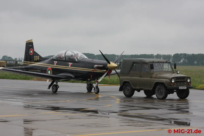 Nice contrast: a Soviet-built UAZ tows a PC-9 made in Switzerland.
