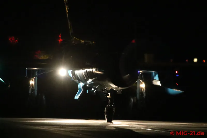 When they return it is completely dark, so that both the landing lights ...