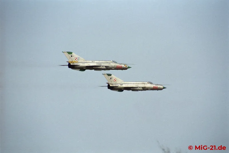 ... to watch the continuing flight operations from outside the base.