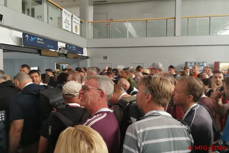 ... several hundred spotters and journalists have gathered and are waiting to be let in.