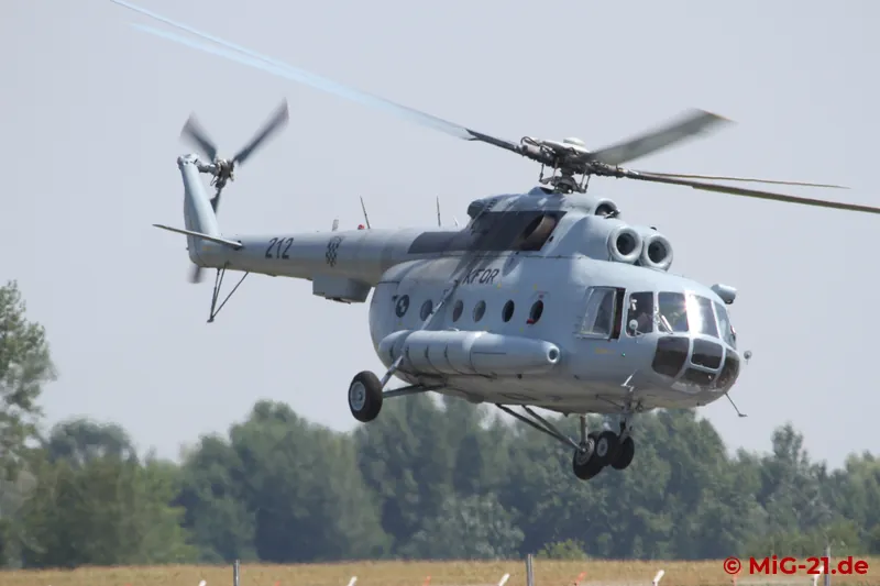 The flying programme was opened by parachutists dropped from this Mi-8.