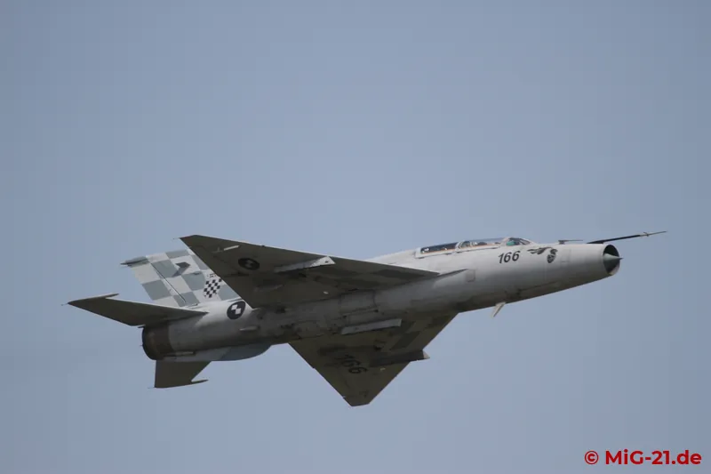 The MiG-21UM solo display took place at the highest position of the sun at 1 p.m., ...