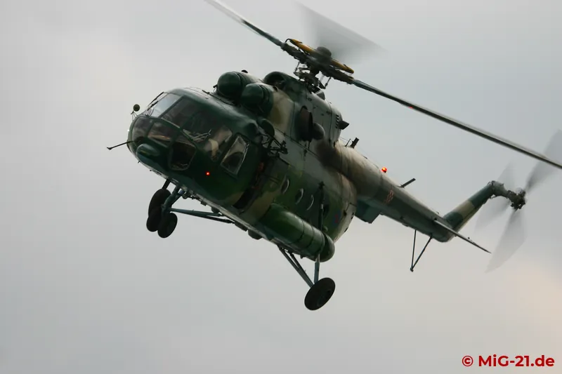 ... the display of two helicopters of the same type still flying in their attractive green colour schemes.
